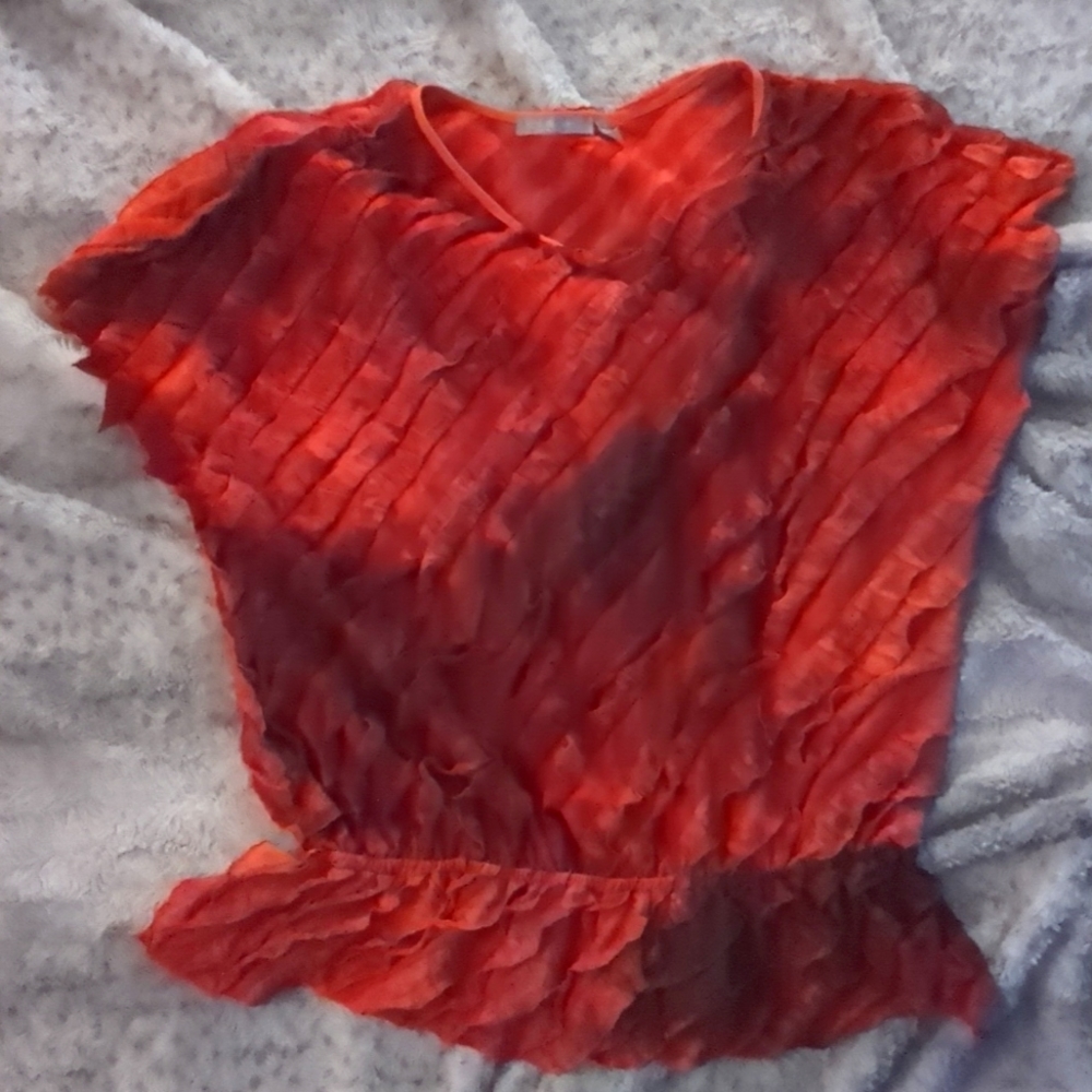 Ruffled red blouse